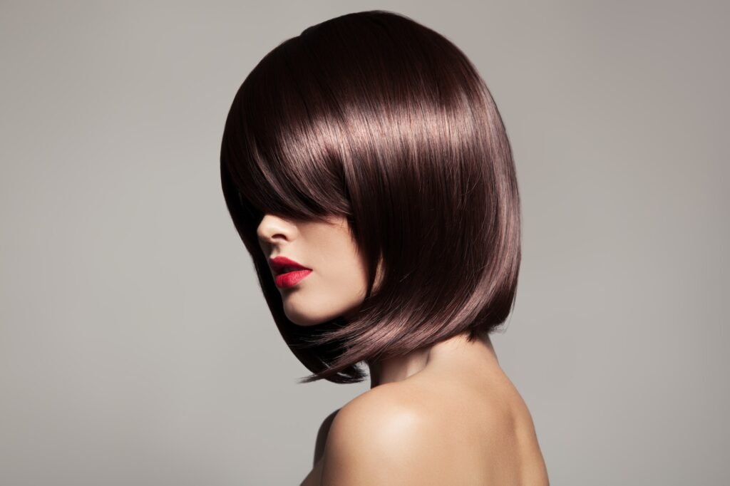 Beautiful model with perfect long glossy brown hair.