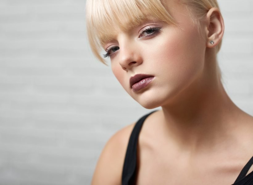 Gogeous blonde model posing sensually